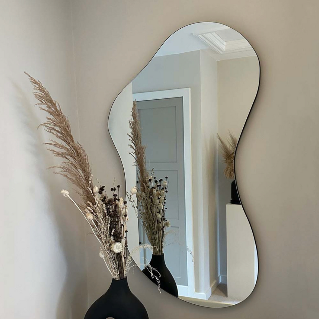 Mirrors with frame with a design of edges titled Keep Glow